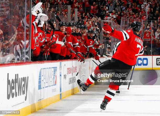 Dougie Hamilton of the New Jersey Devils scores a second period goal against the Arizona Coyotes at Prudential Center on October 13, 2023 in Newark,...