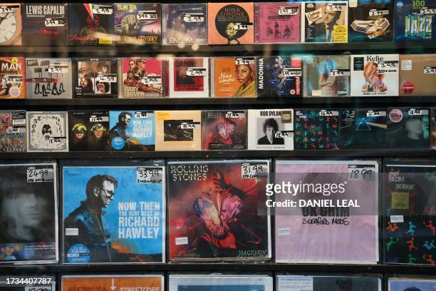 Selection of contemporary and classic CDs and vinyl records are seen on display in Sister Ray Records in London on October 20, 2023.