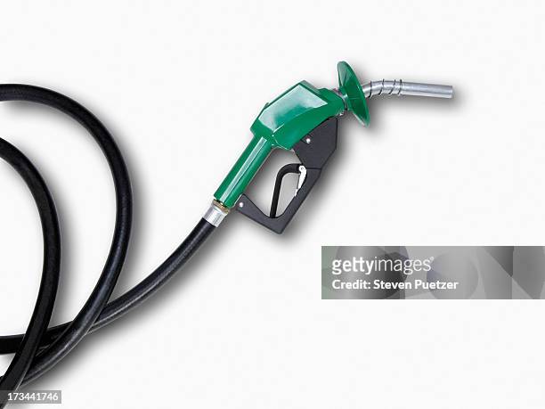 green fuel pump - gas pump stockfoto's en -beelden