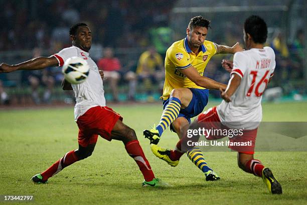 Oliver Giroud of Arsenal scores a goal during the match between Arsenal and the Indonesia All-Stars at Gelora Bung Karno Stadium on July 14, 2013 in...