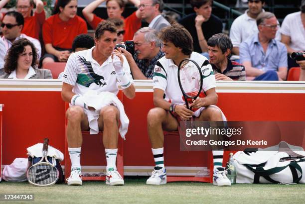 Tennis players Ivan Lendl and Henri Leconte during a break of the final match of the Men's Doubles at the Stella Artois Championships held at Queen's...