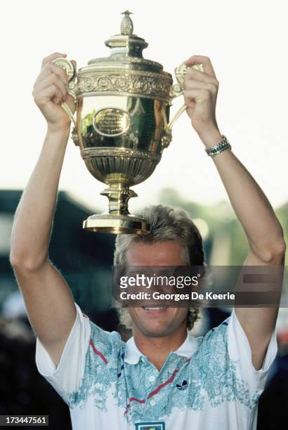 Swedish player Stefan Edberg with his trophy after winning the Men's Singles at the Wimbledon Championships on July 8, 1990 in London, England.