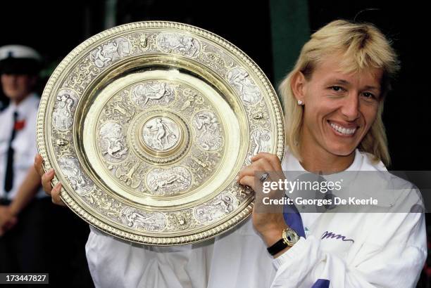 Tennis player Martina Navratilova with her trophy after winning the Women's Singles at the Wimbledon Championships on July 8, 1990 in London, England.