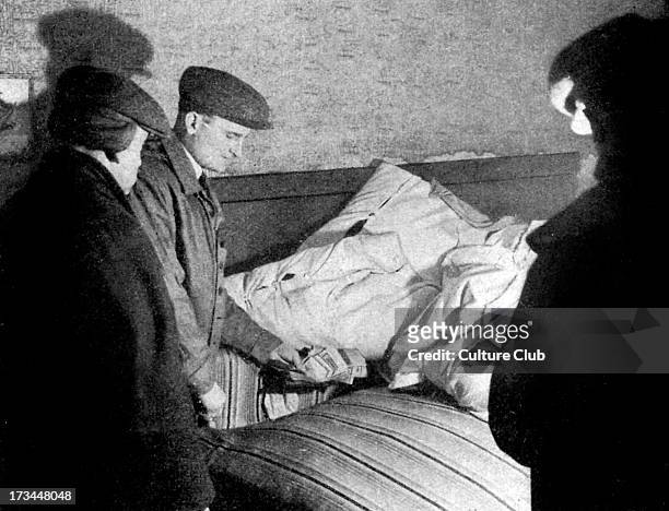 'Gold in the Ghetto' : Anti-Jewish propaganda from German newspaper. Photo from Lodz Ghetto. Security police find money hidden in a bed. Caption...
