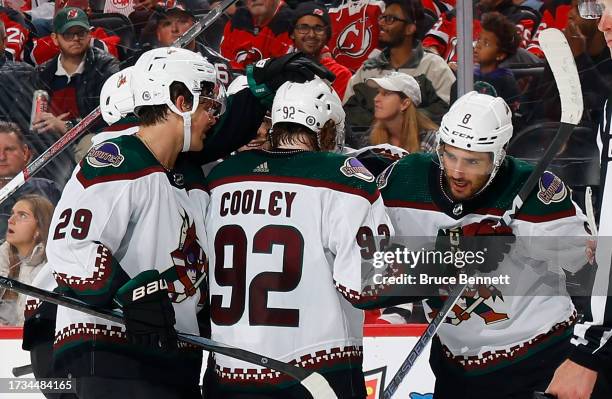 The Arizona Coyotes celebrate a powerplay goal by Nick Schmaltz at 13:55 of the third period against the New Jersey Devils at Prudential Center on...