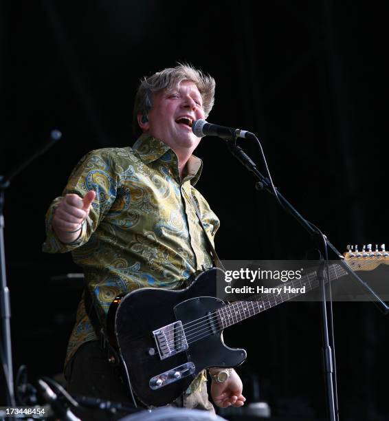 Glenn Tilbrook of Squeeze performs on stage at Magic Summer Live Festival 2013 at Stoke Park on July 14, 2013 in Guildford, England.