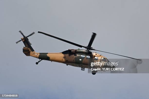 Jordanian Air Force UH-60 Black Hawk military transport helicopter carrying the Palestinian president takes off from the West Bank city of Ramallah...