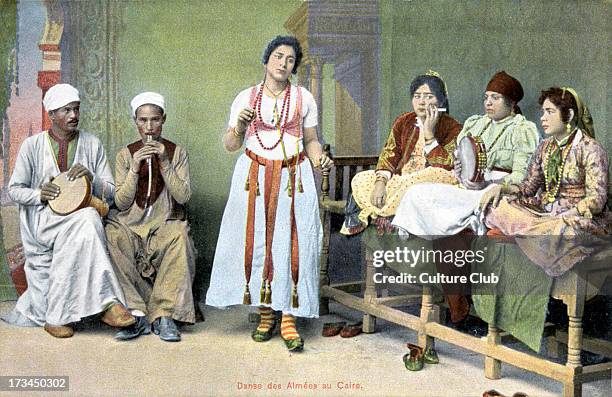 Egyptian dancing girls in Cairo. Musicians playing tambourine and flute. Caption reads: danse des Almées au Caire'.