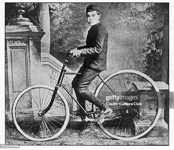 The son of J.B. Dunlop riding the first bicycle with inflatable tyres. John Boyd Dunlop was a Scottish inventor who developed the first practical...