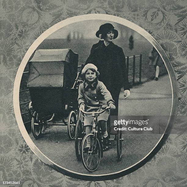 Elizabeth II and Queen Margaret as children with a nanny. Caption reads 'Princess Elizabeth riding her new tricycle in the park - with her sister in...