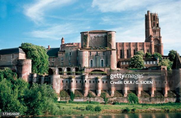 Albi Cathedral, formally the Cathedral of Saint Cecilia , seen from the Tarn River, Albi , Midi-Pyrenees, France.