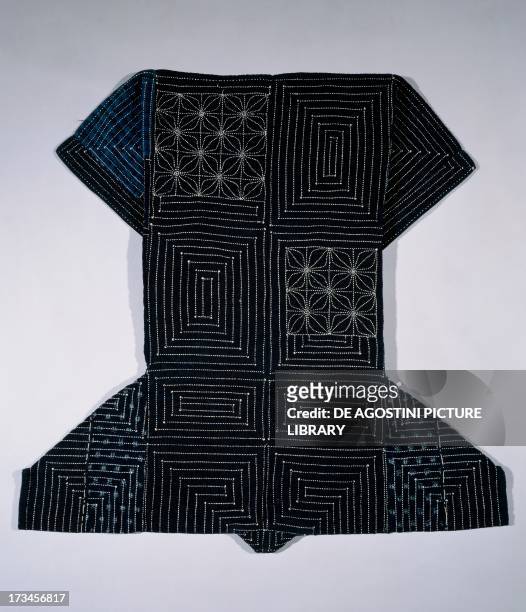 Working Jacket in cotton, Meiji period , quilted hemp leaves in concentric square pattern, 108x115 cm, dip dyed indigo, Japan.