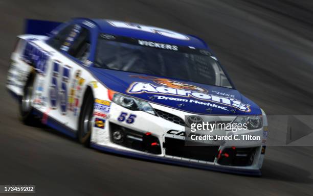 Brian Vickers drives the Aaron's Dream Machine Toyota during the NASCAR Sprint Cup Series Camping World RV Sales 301 at New Hampshire Motor Speedway...