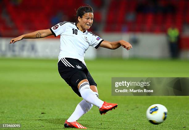 Dzsenifer Marozsan of Germany runs with the ball during the UEFA Women's Euro 2013 group B match between Iceland and Germany at Vaxjo Arena on July...