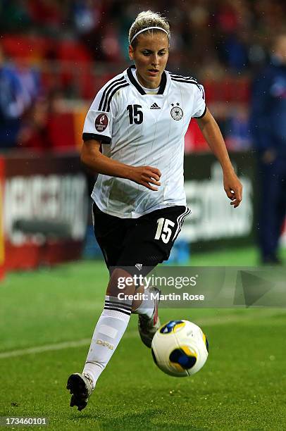 Jennifer Cramer of Germany runs with the ball during the UEFA Women's Euro 2013 group B match between Iceland and Germany at Vaxjo Arena on July 14,...