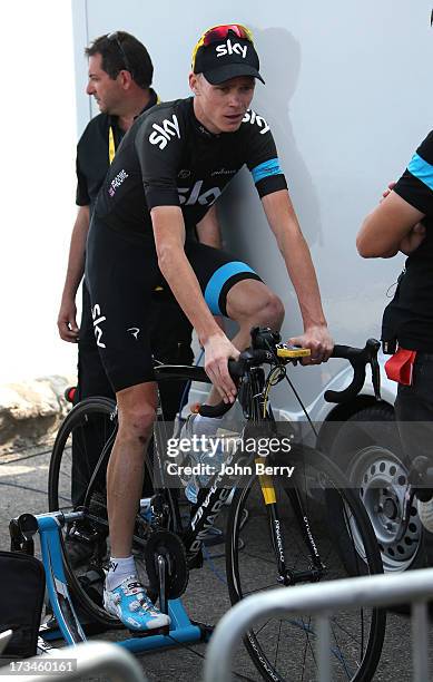 Race Leader Christopher Froome of Great Britain and Team Sky Procycling rides home trainer after stage fifteen of the 2013 Tour de France, a 242.5KM...