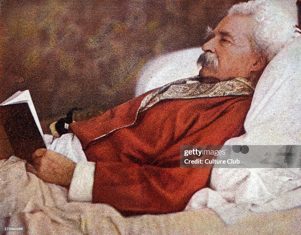 Mark Twain reading in bed