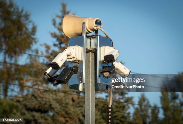 Bundle of security cameras are seen with a loudspeaker in Warsaw, Poland on 17 October, 2023.