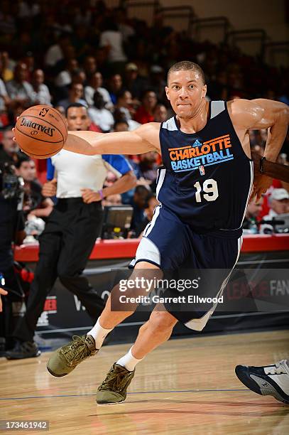Brandon Triche of the Charlotte Bobcats drives against the Dallas Mavericks during NBA Summer League on July 14, 2013 at the Cox Pavilion in Las...