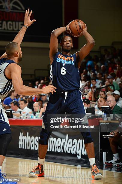 Patrick Ewing Jr. #6 of the Charlotte Bobcats looks to pass the ball against the Dallas Mavericks during NBA Summer League on July 14, 2013 at the...