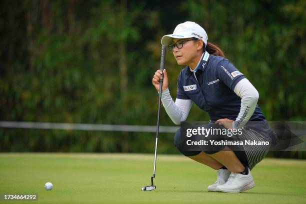 Sakura Yokomine of Japan lines up a putt on the 6th green during the second round of Udon-Ken Ladies Golf Tournament at Mannou Hills Country Club on...