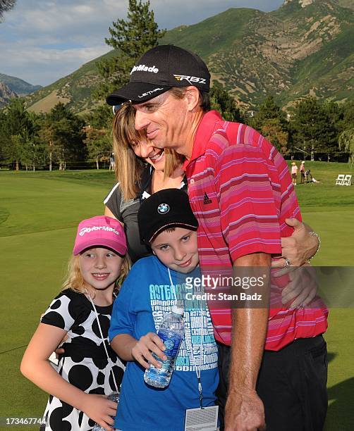 Steven Alker of New Zealand celebrate's his win with his family on the 18th green during the final round of the Utah Championship Presented by Utah...