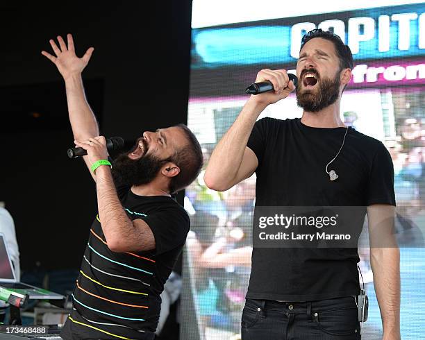 Sebu Simonian and Ryan Merchant of Capital Cities perform at Mackapoolza held at the Clevelander South Beach on July 14, 2013 in Miami Beach, Florida.