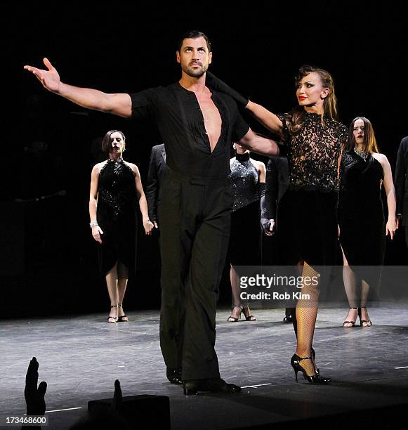 Maksim Chmerkovskiy and Karina Smirnoff attend "Forever Tango" curtain call Broadway Opening Night at Walter Kerr Theatre on July 14, 2013 in New...