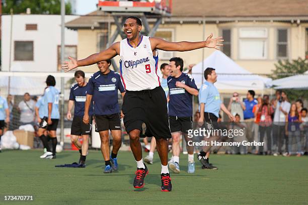Professional basketball player Jared Dudley plays soccer at the Salvation Army Red Shield Youth & Community Center on July 14, 2013 in Los Angeles.