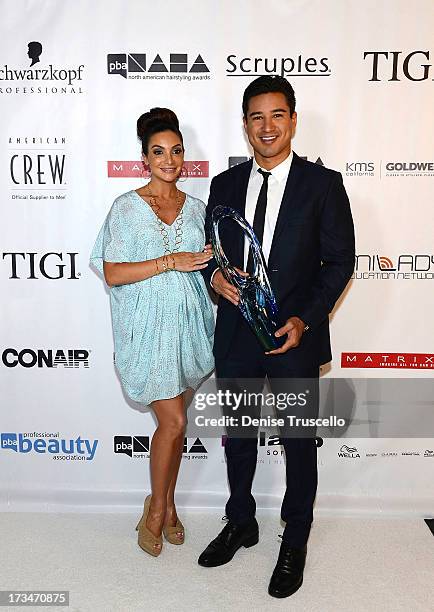 Courtney Mazza and Mario Lopez arrive at the 2013 North American Hairstyling Awards at Mandalay Bay on July 14, 2013 in Las Vegas, Nevada.