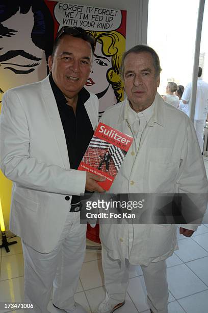 Pierre Guillermo and Paul Loup Sulitzer attend the 14th July White Party at the Pierre Guillermo residence on July 14, 2013 in Paris, France.