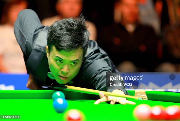 Marco Fu of Hong Kong plays a shot during the final match against Neil Robertson of Australia during the World Snooker Australia Open at the Bendigo...