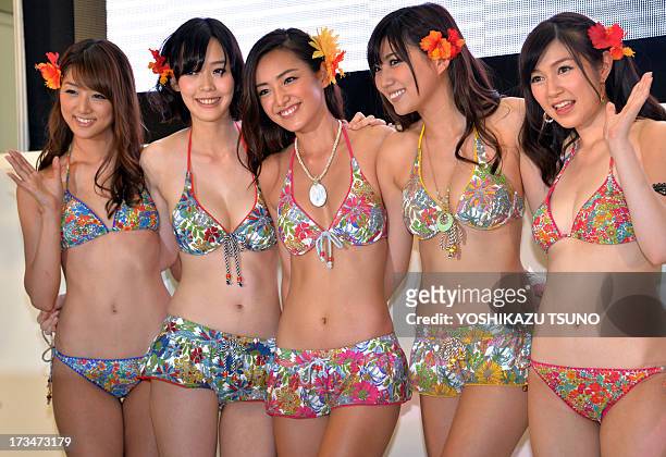 models-display-the-latest-swimsuit-collection-from-japanese-apparel-maker-san-ai-in-tokyo-on.jpg