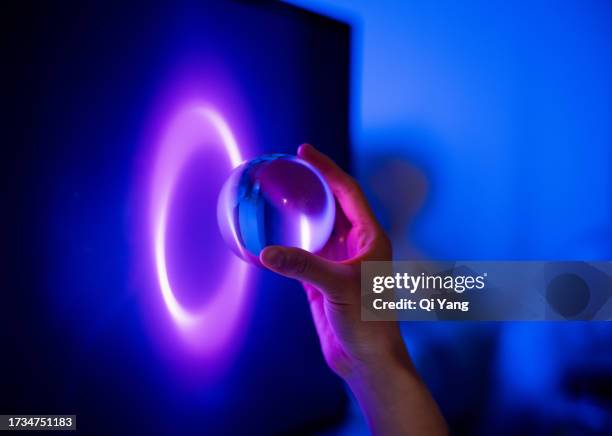 close-up with crystal ball in hand - hands forming star stock pictures, royalty-free photos & images