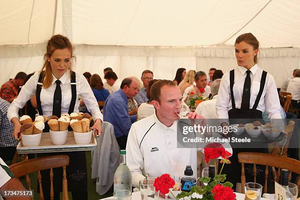 Guests enjoy an exclusive cricket day in the idyllic surroundings of the Getty family estate at Wormsley, Buckinghamshire on July 12, 2013 in...