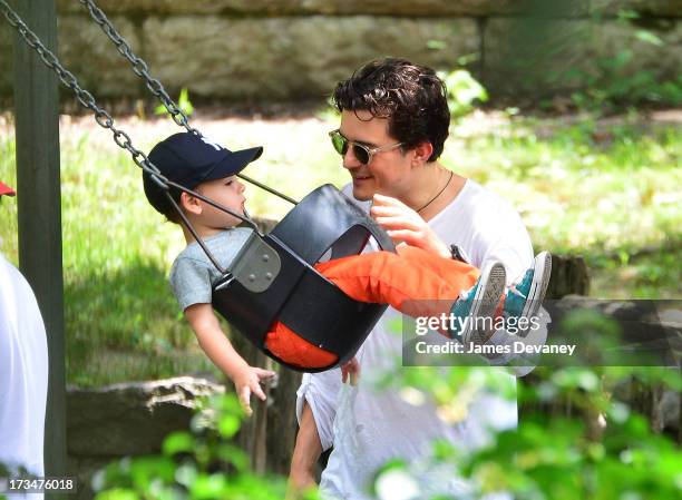 Orlando Bloom and son Flynn Bloom visit Central Park on July 14, 2013 in New York City.