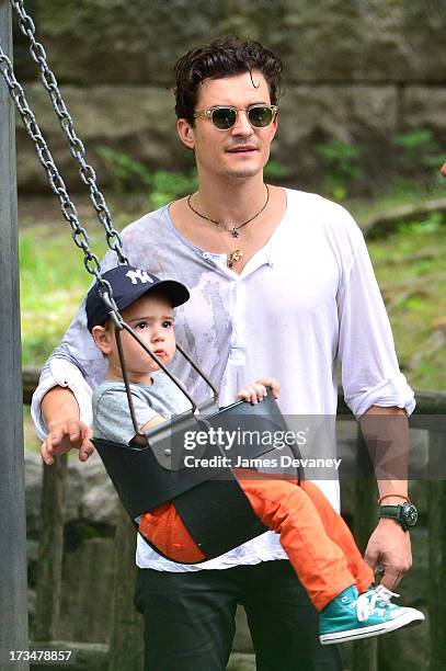 Orlando Bloom and son Flynn Bloom visit Central Park on July 14, 2013 in New York City.