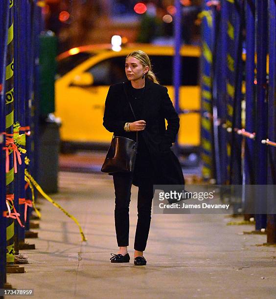Mary-Kate Olsen leaves Wolfgang's Steakhouse on July 14, 2013 in New York City.