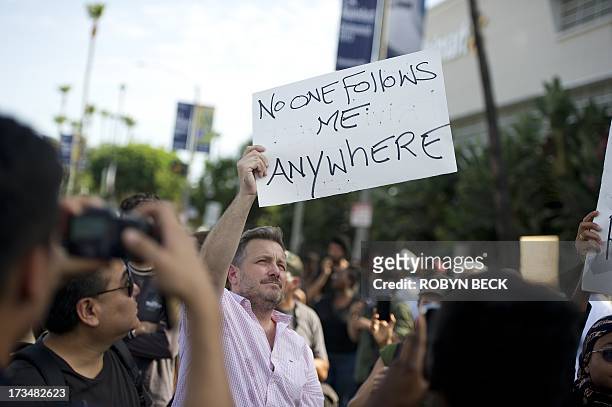 Demonstrators angry at the acquittal of George Zimmerman in the death of Trayvon Martin protest in Los Angeles, California July 14, 2013. Thousands...
