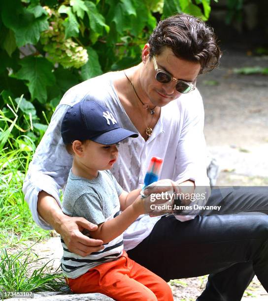 Orlando Bloom and son Flynn Bloom visit Central Park on July 14, 2013 in New York City.