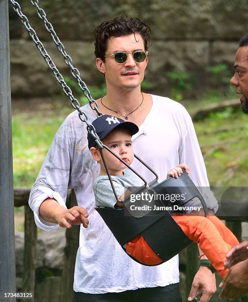 Orlando Bloom and son Flynn Bloom visit Central Park on July 14, 2013 in New York City.