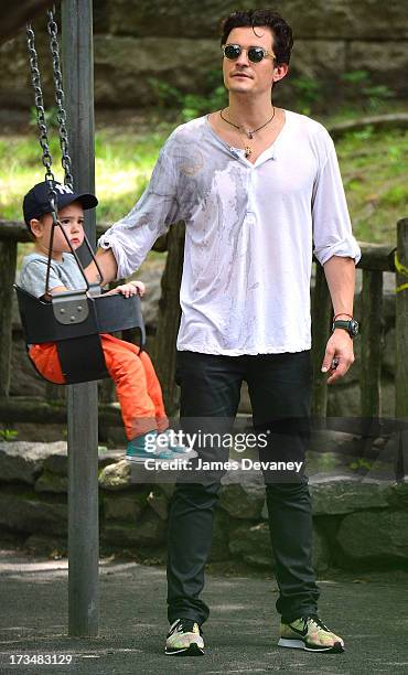 Orlando Bloom and son Flynn Bloom visit Central Park on July 14, 2013 in New York City.