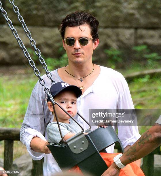 Orlando Bloom and son Flynn Bloom visit Central Park on July 14, 2013 in New York City.