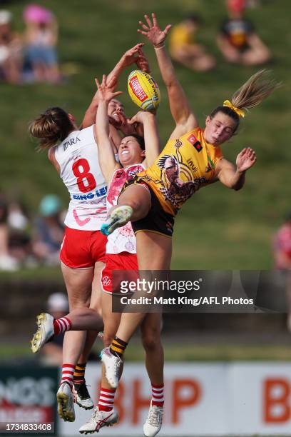 Sophie Locke of the Hawks competes for the ball against Rebecca Privitelli of the Swans during the round seven AFLW match between Sydney Swans and...