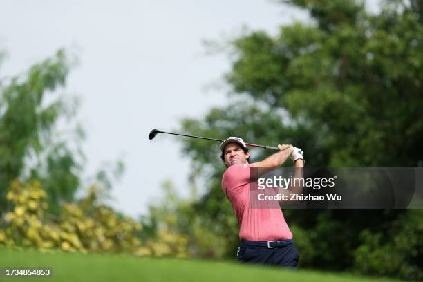 Ricardo Gouveia of Portugal plays a shot during Day Two of the Hainan Open at Danzhou Ancient Saltern Golf Club on October 14, 2023 in Hainan Island,...