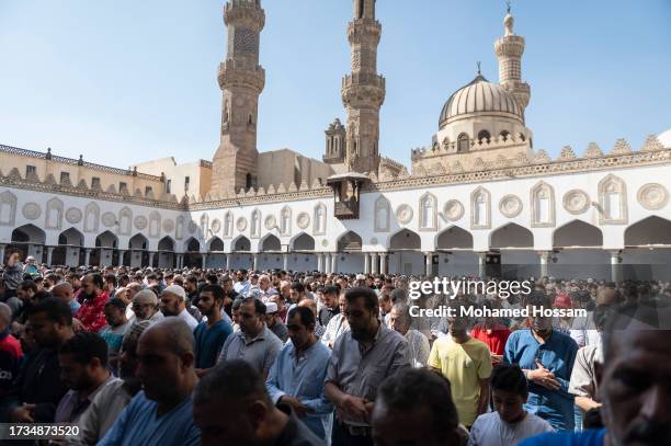 Worshipers doing absentee funeral prayers before a protest in support of the Palestinian people, in the Gaza Strip, at Al Azhar mosque, on October...