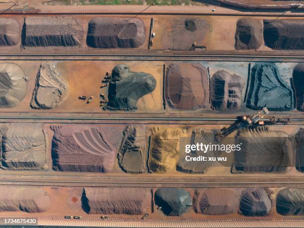aerial view of metal raw materials stacked at freight terminal - sol phénomène naturel photos et images de collection