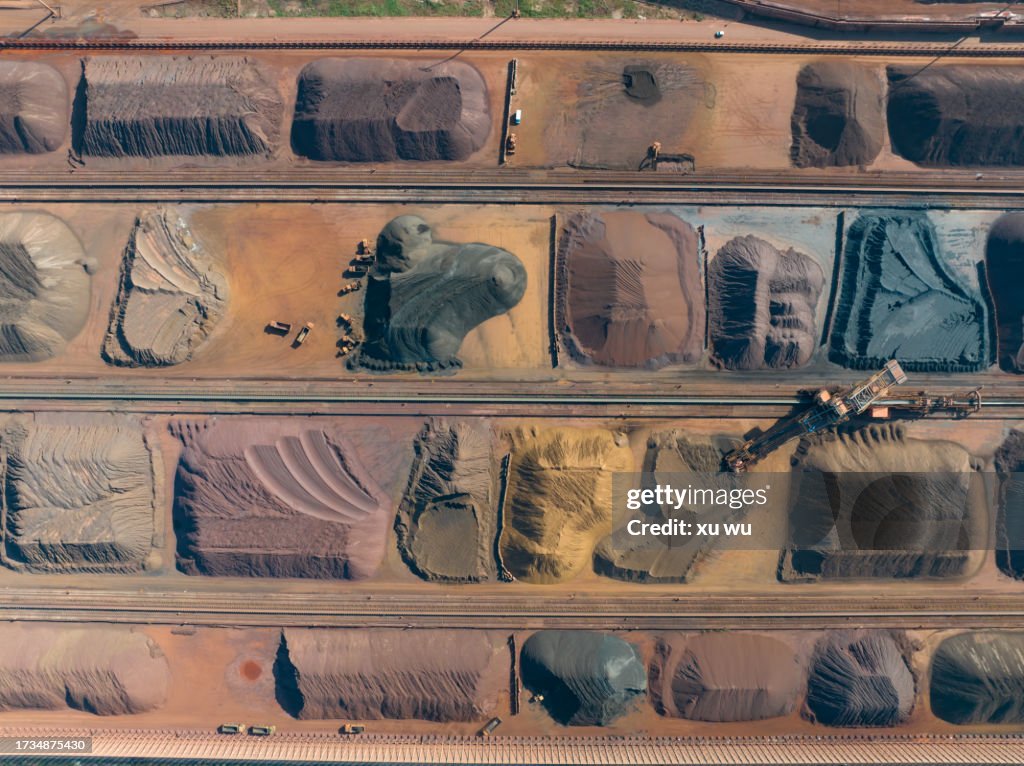 Aerial view of metal raw materials stacked at freight terminal