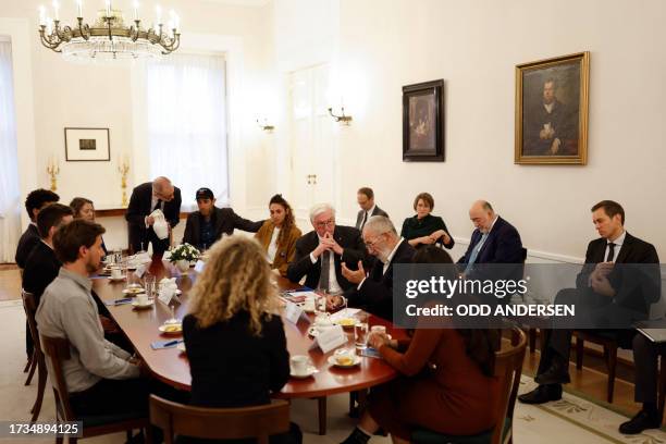 German President Frank-Walter Steinmeier meets and speaks with relatives of German citizens allegedly abducted by Palestinian militant group Hamas,...