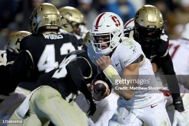 Justin Lamson of the Stanford Cardinal carries the ball for a touchdown against the Colorado Buffaloes in the fourth quarter at Folsom Field on...
